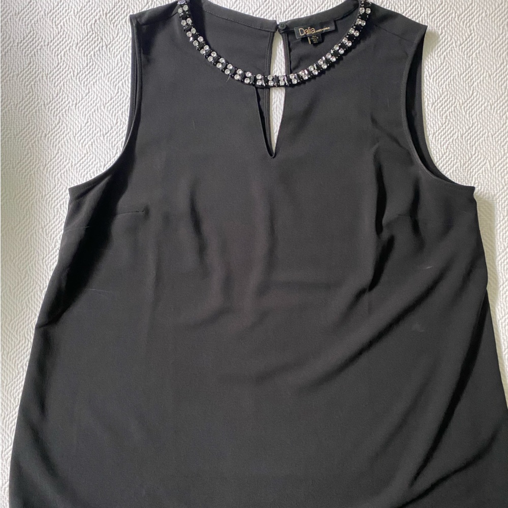 Elegant Black Sleeveless Top with Embellished Neckline